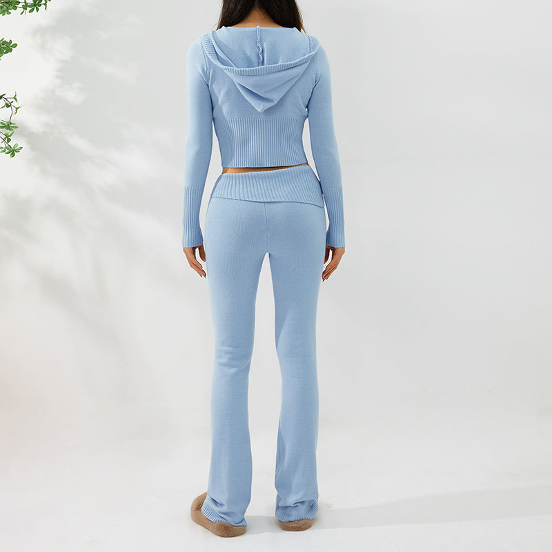 Light blue knit hoodie and pants set on a white background