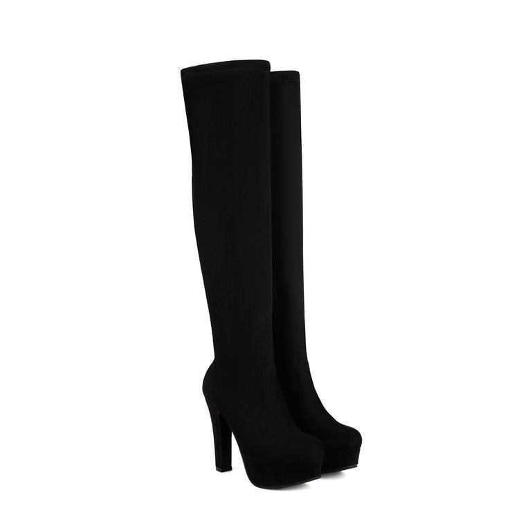 Pink knee-high boots with high heels on a white background