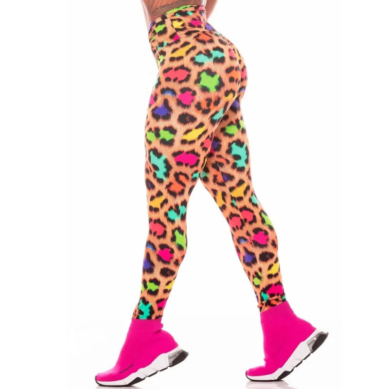 Colorful leopard print leggings with pink socks on a white background
