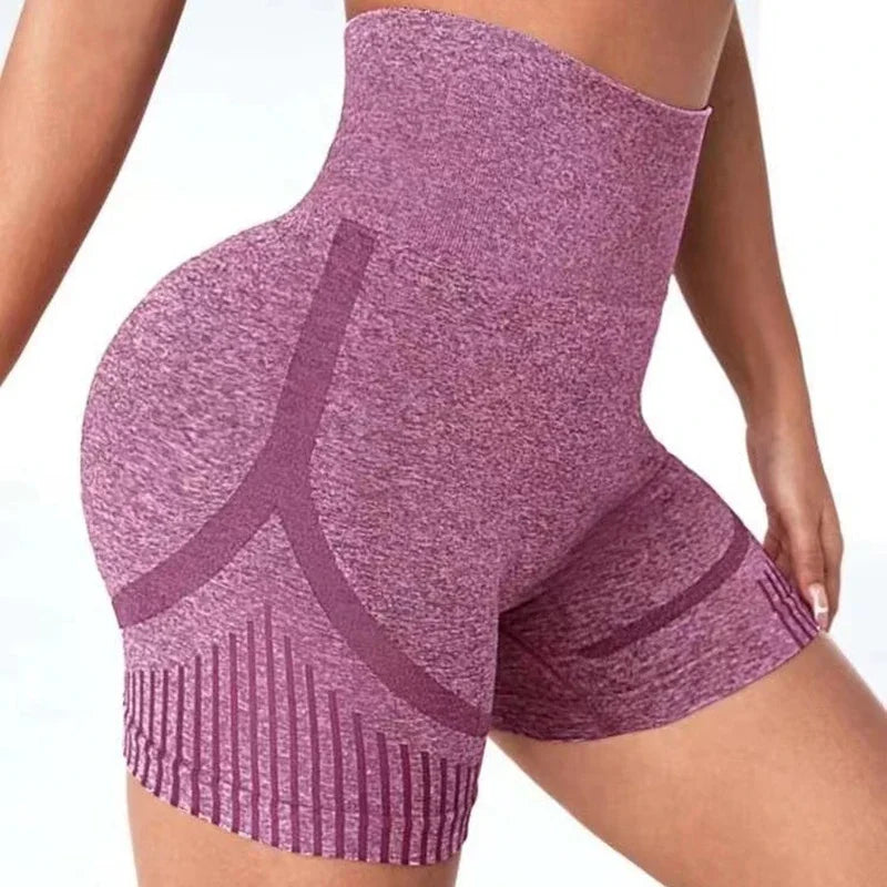 Purple athletic shorts with a design on a white background