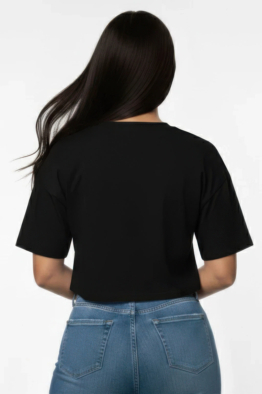 Person wearing a black t-shirt and blue jeans on a white background and showing the back of the tshirt