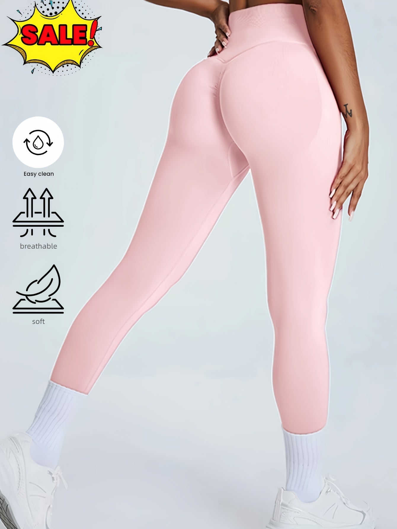 Pink leggings worn by a person on a light gray background with sale and feature icons.