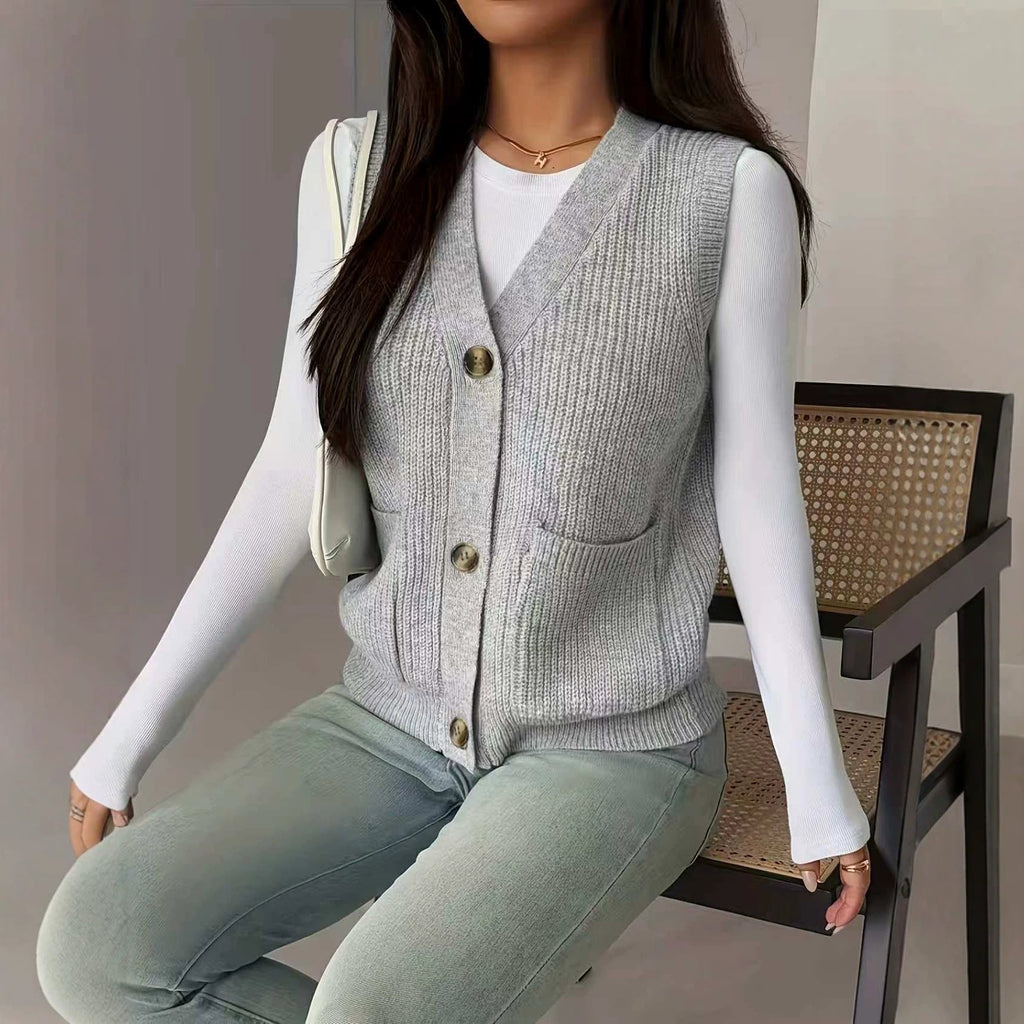 Women's Loose Single-Breasted Knit Sweater Vest sitting on a chair